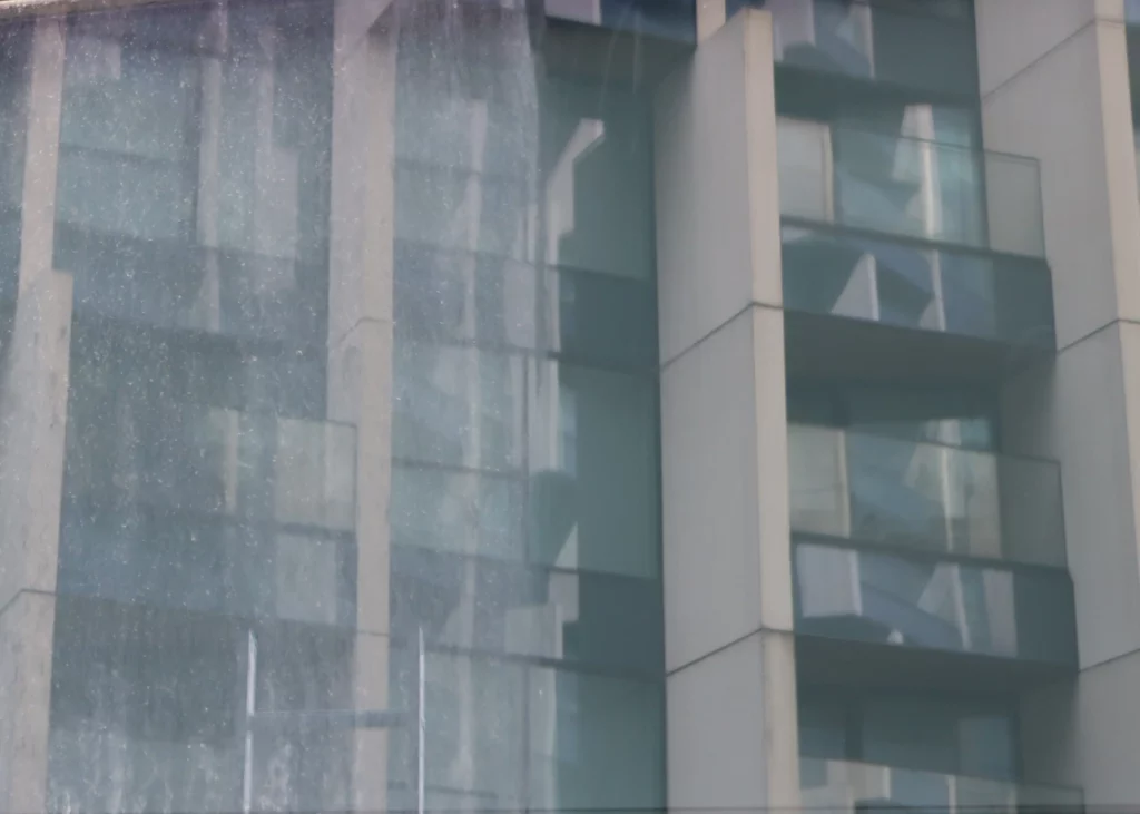 apartment blocks with glass balconies in london